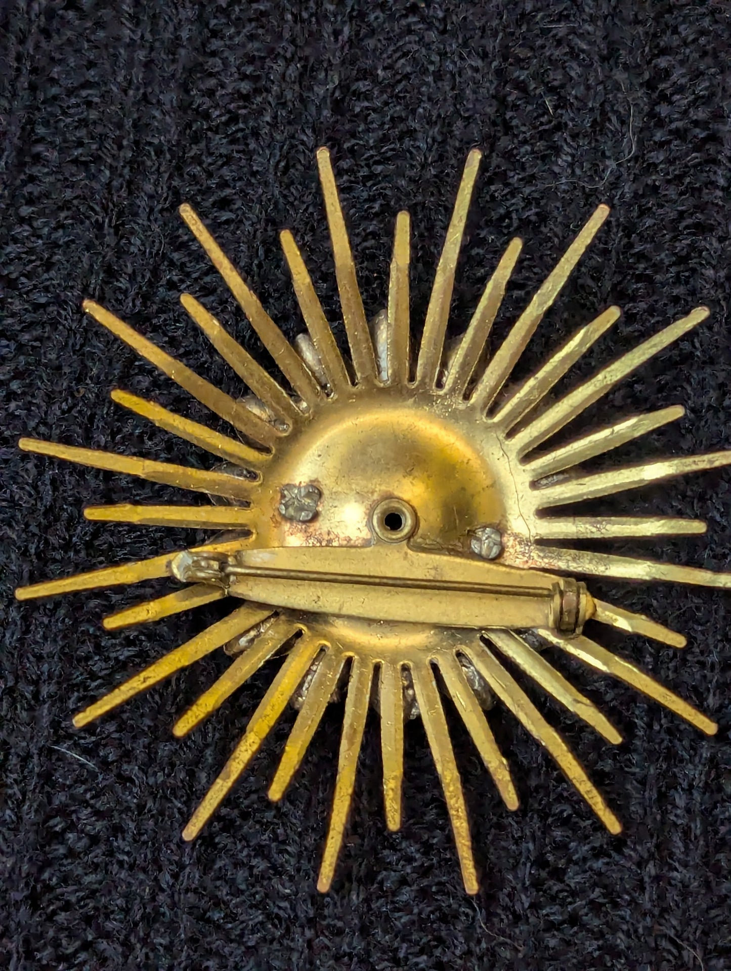 Antique Rainbow starburst shaped broach
