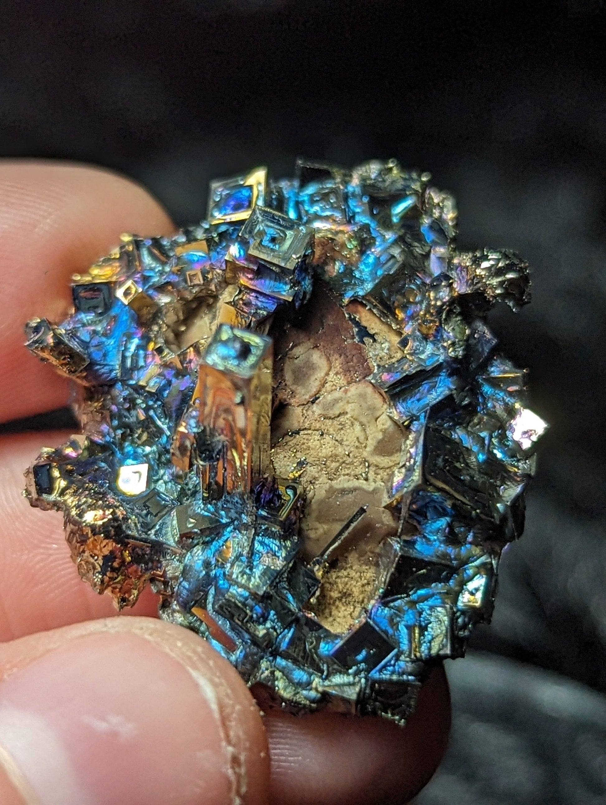 EsotericMineralsnCrystals Bismuth Crystal on River Rock