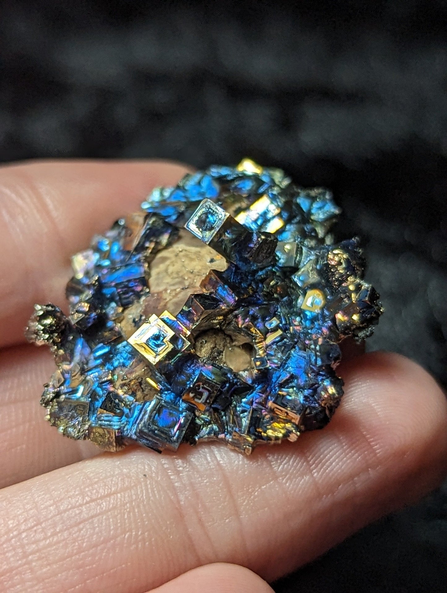 EsotericMineralsnCrystals Bismuth Crystal on River Rock