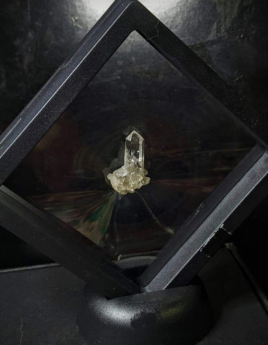 EsotericMineralsnCrystals Gemstones Arkansas Clear quartz point in display